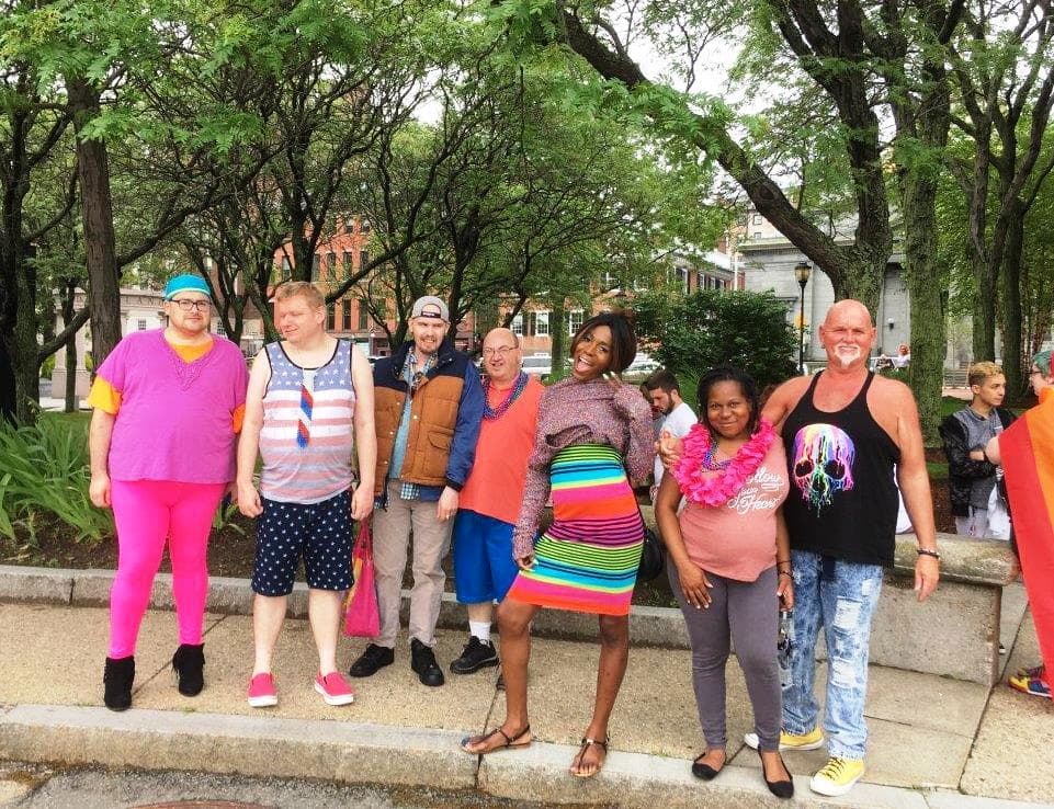 Delta Projects community members together at Pride